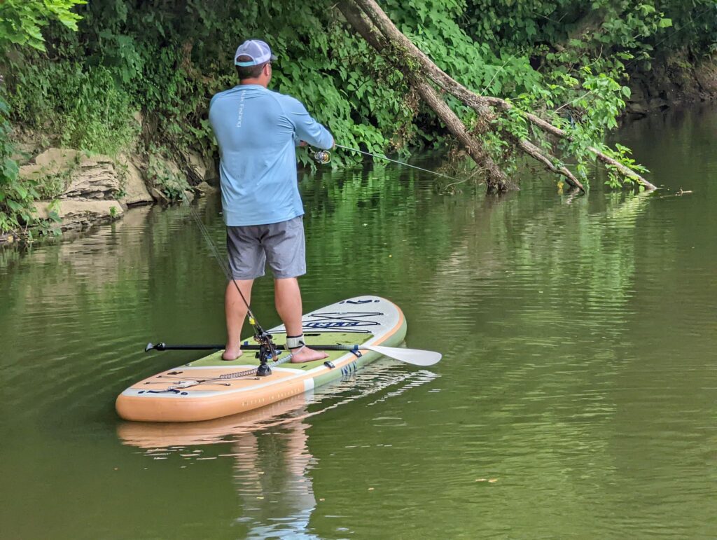 Fishing on a Creek from Paddle Board